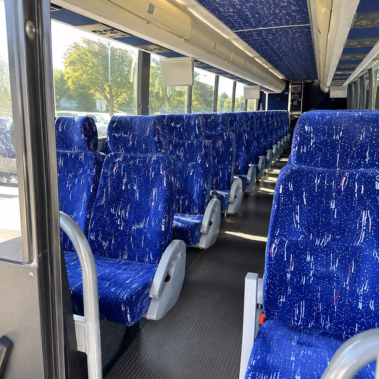 columbia 50 passenger charter bus inside